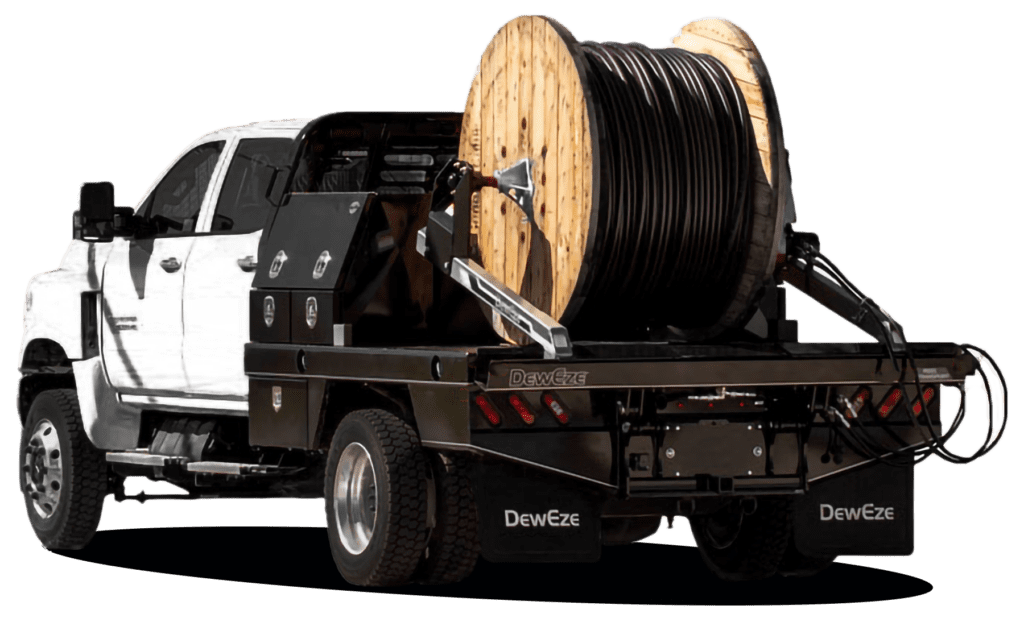 A reel loader truck rental from City Rent a Truck, designed for efficient transportation and deployment of heavy cable reels.
