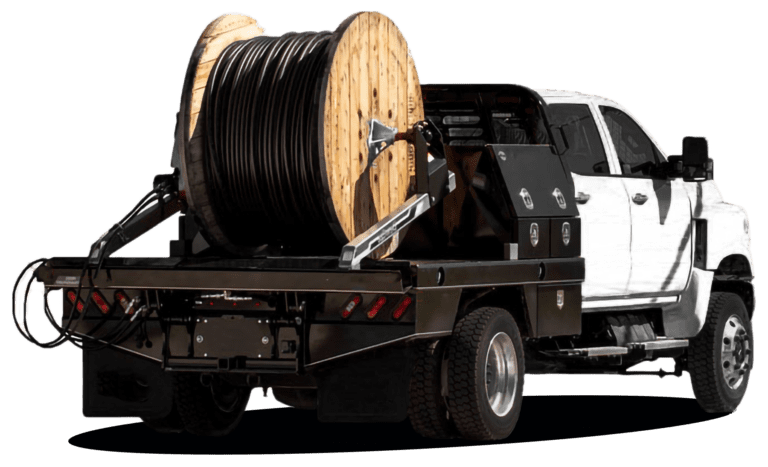 F550 Reel Loader truck rental with hydraulic reel lift and 4x4 capability, ideal for utility and cable installation projects.